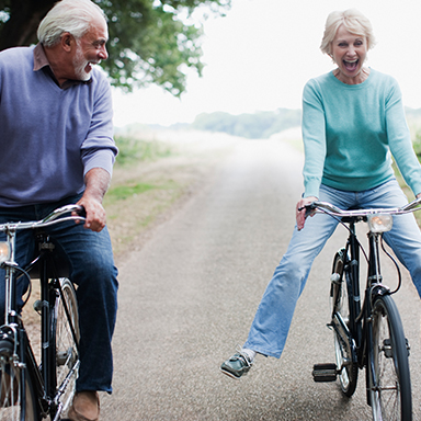 Mature people on bicycles, Mobilrity, Chiropractor Bangor